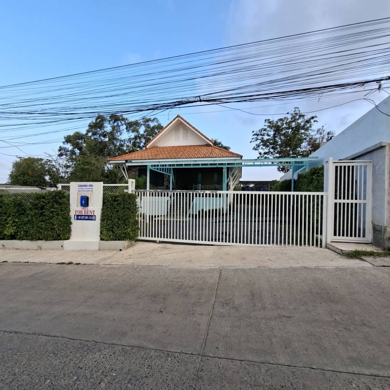 Private gated entrance to the villa on a quiet Koh Samui street